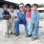 Dr. Salter Takes a Picture With Guatemalan Patients on a Mission Trip
